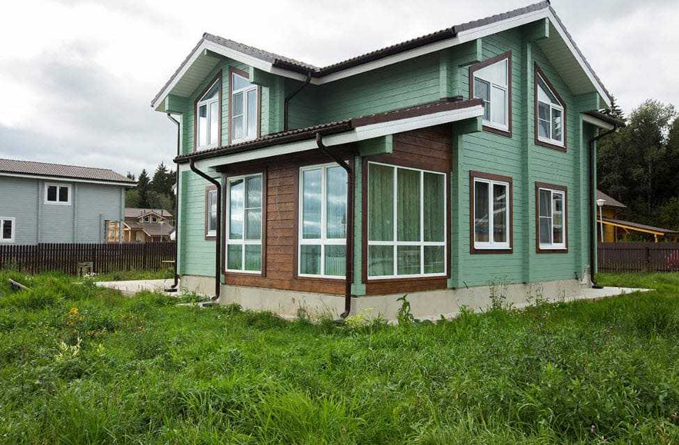 Как покрасить внешнюю сторону деревянного дома?
