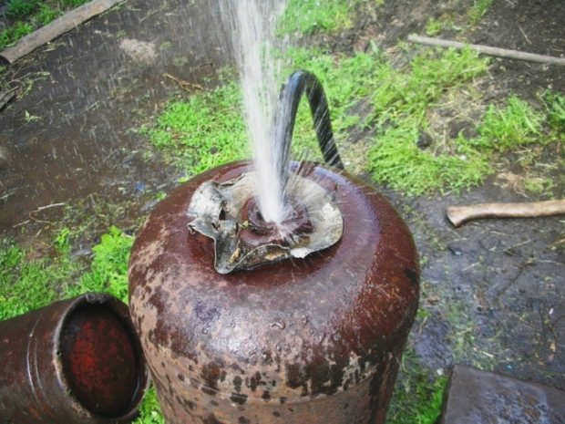 Слив воды из газового баллона