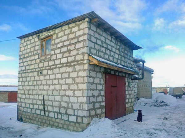 Гараж на две машины экономит место на участке