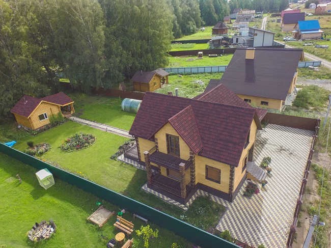 где поставить дом на участке