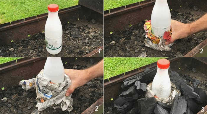 Обертывание газеты вокруг бутылки и укладка углей