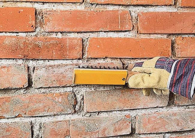 Как очистить кирпич от строительного раствора